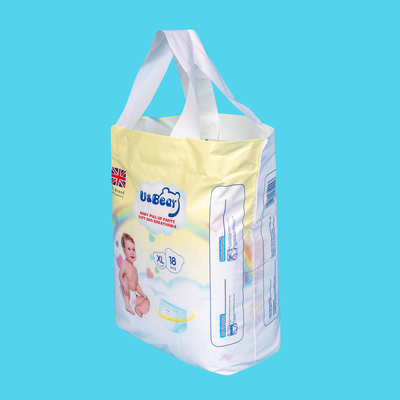 El bebé blanco del ADL levanta los pantalones que la absorbencia estupenda orgánica levanta los pañales impresos